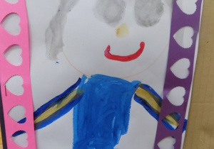 Portret pani Marty narysowany przez dziecko.
