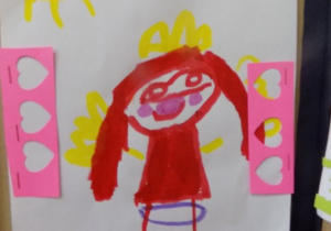 Portret pani Izy narysowany przez dziecko.