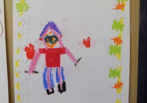 Portret pani Marzeny narysowany przez dziecko.