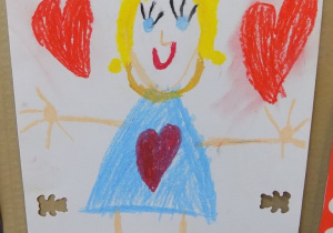 Portret pani Ewy narysowany przez dziecko.