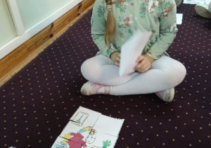 Dzieci układają puzzle z Guciem